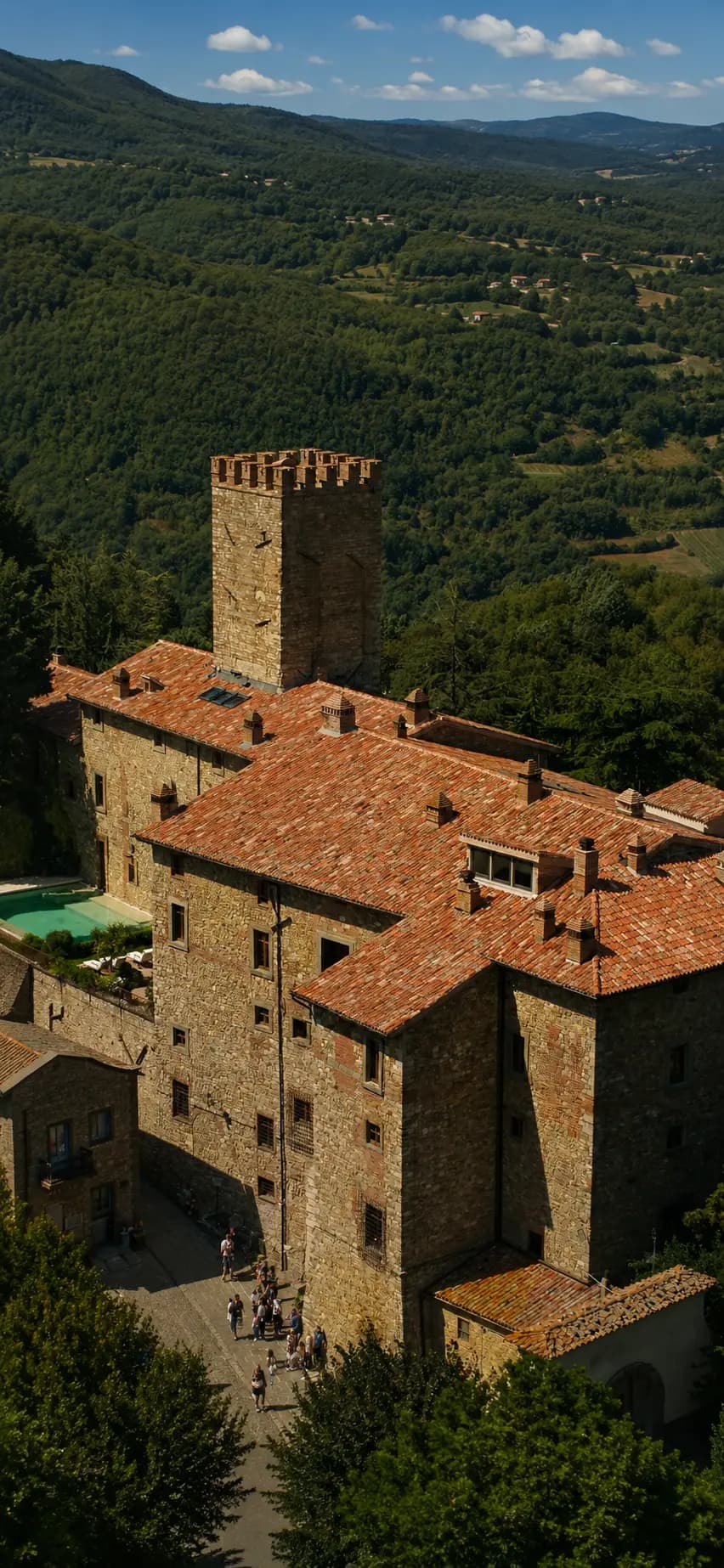 Aerial view of Parrano village perched on the cliff, surrounded by Umbrian forests